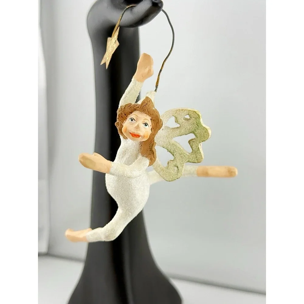 Dancing Angel With A Star Glittery Ornament. 5.5
